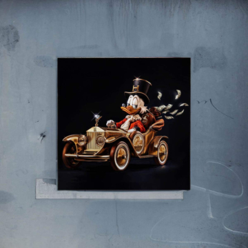 Złote auto inspirowane Scrooge’em McDuckiem - plakat