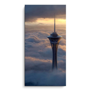 Torres entre nubes en horizonte urbano - cuadro PVC mate