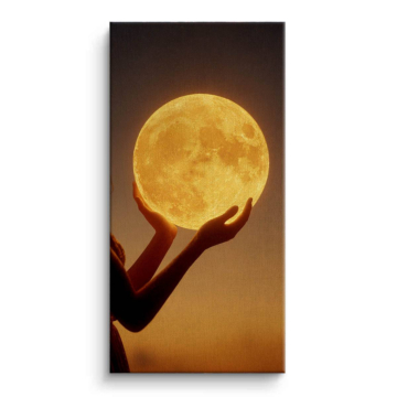 Moon Held in Hands Canvas Art